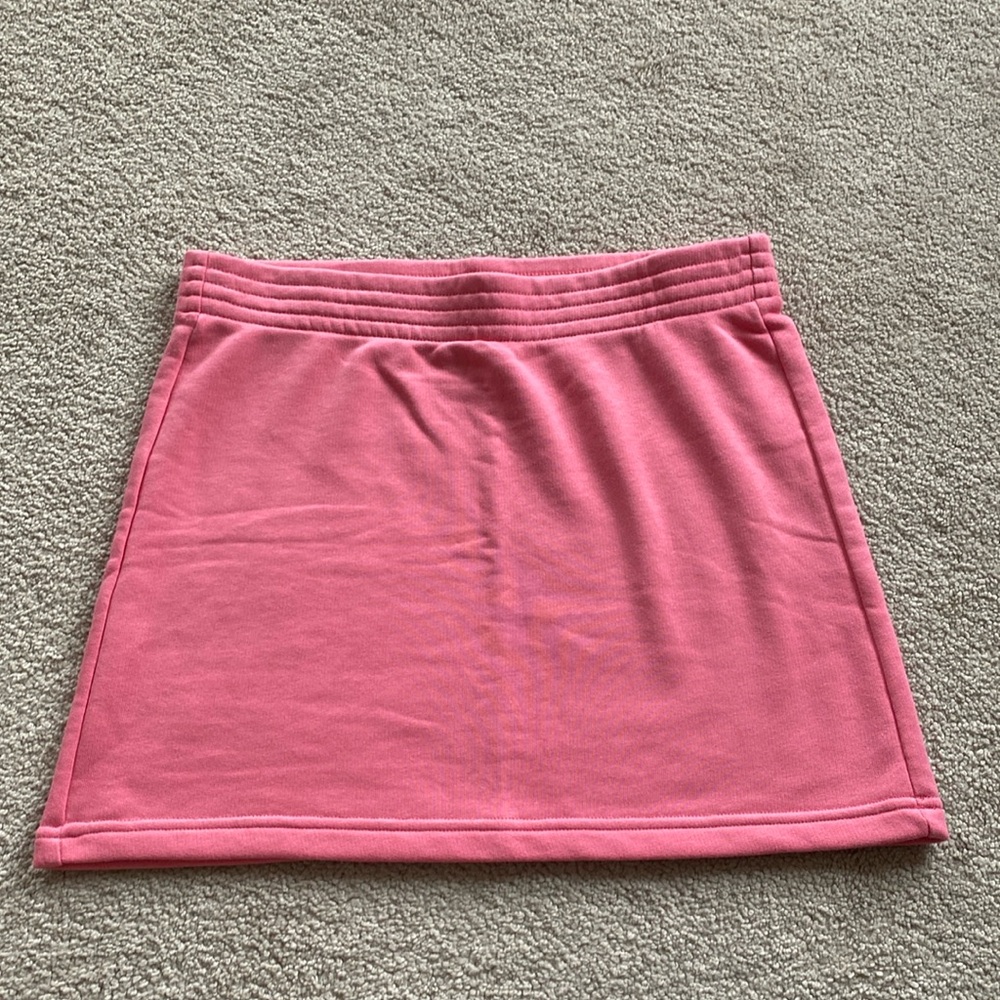 TNA airy perfect skirt. Pink size small in like new condition